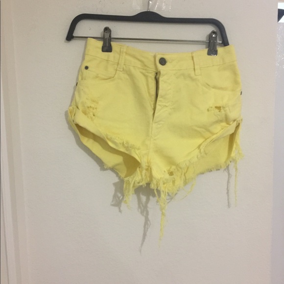 Zara Pants - Zara destroyed yellow denim shorts.